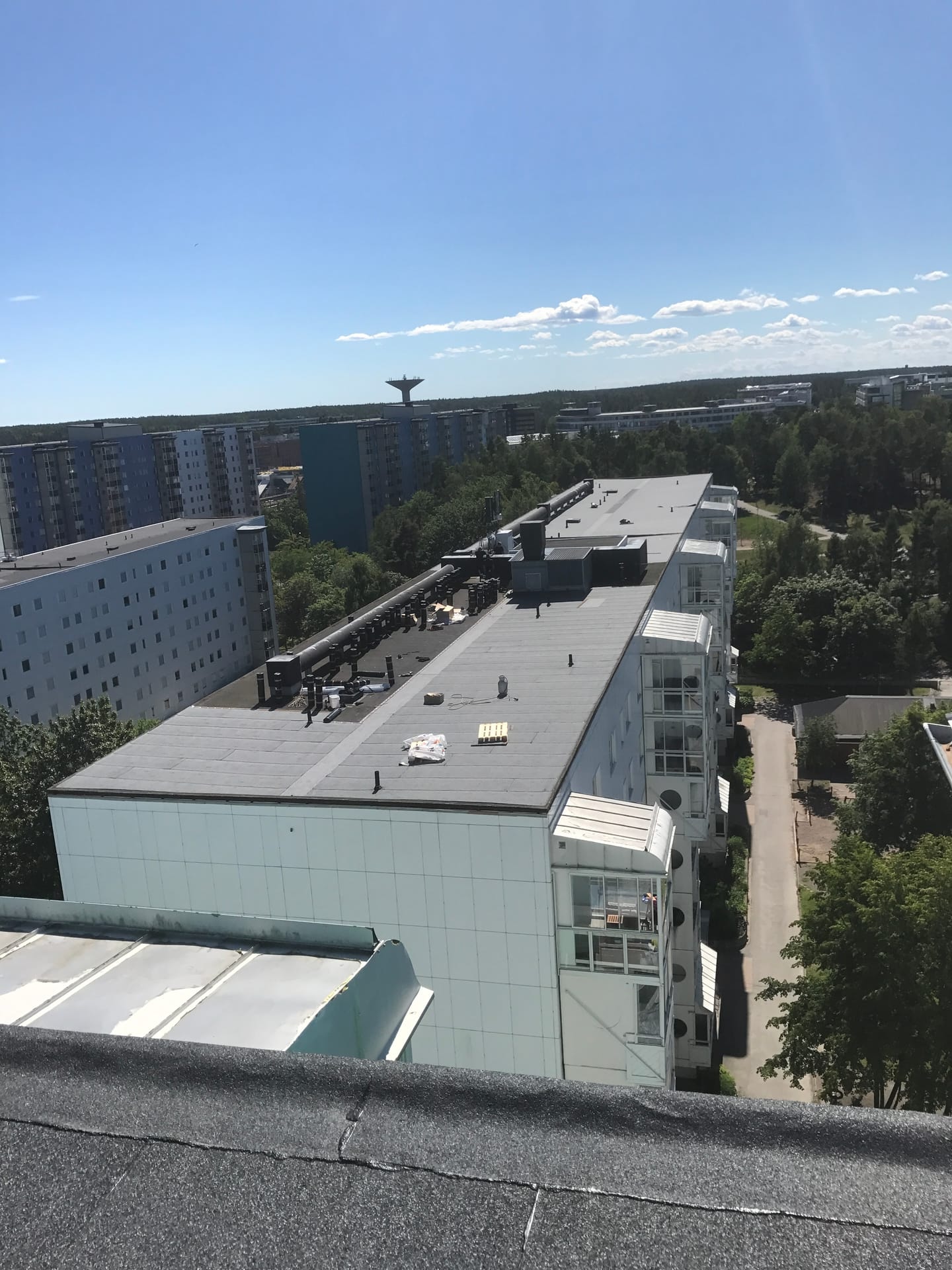 Omläggning av papptak på flerbostadshus i Stockholm